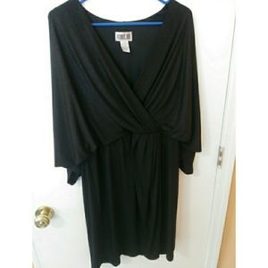 Mock wrap shimmery mini black dress.